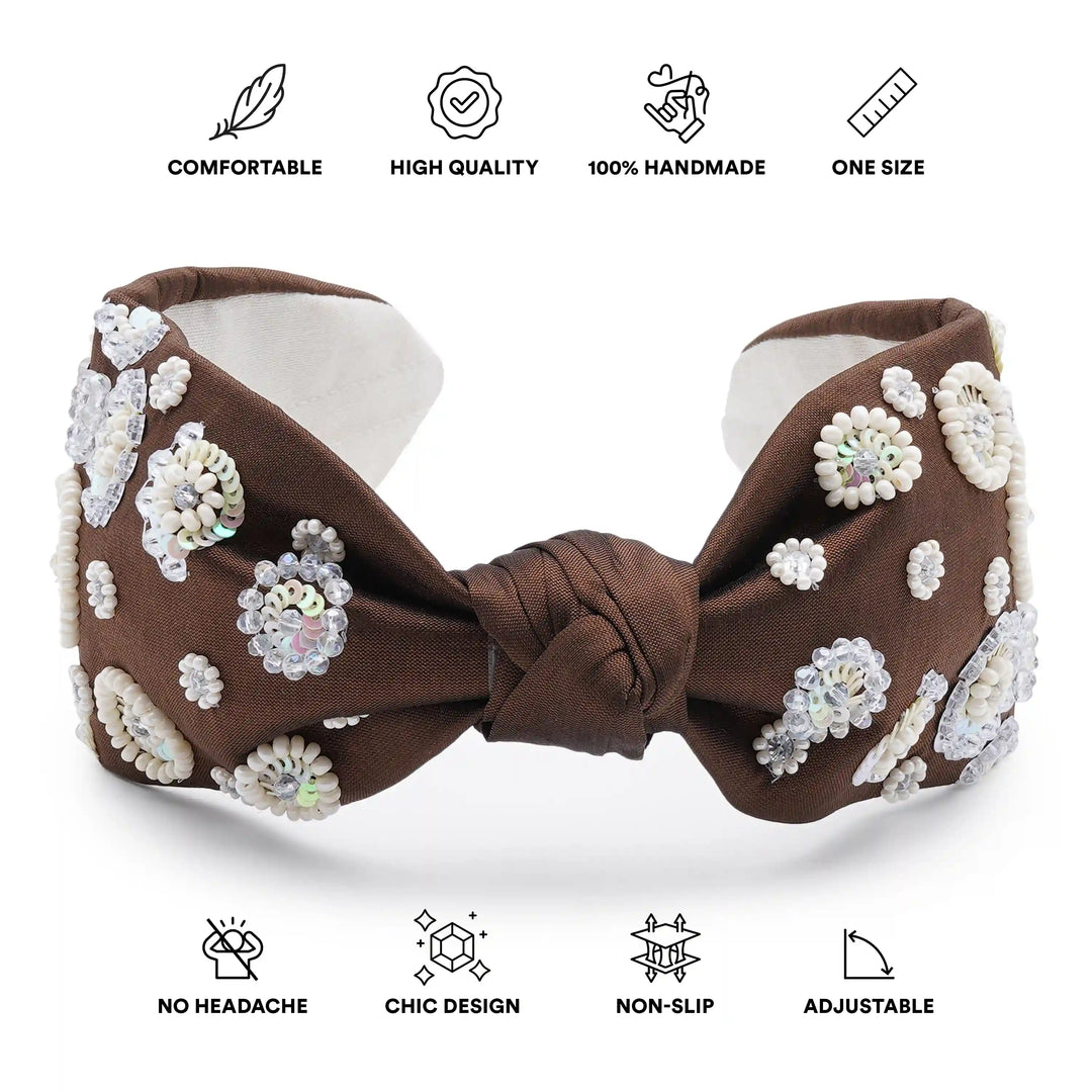 Brown bow headband with white floral patterns on a white background, featuring icons and text about product features.