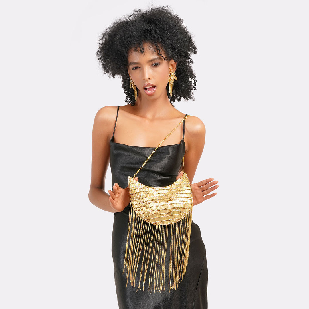 Twirl & Tassel Clutch Bag