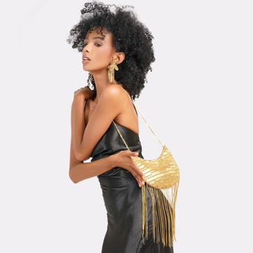 Twirl & Tassel Clutch Bag