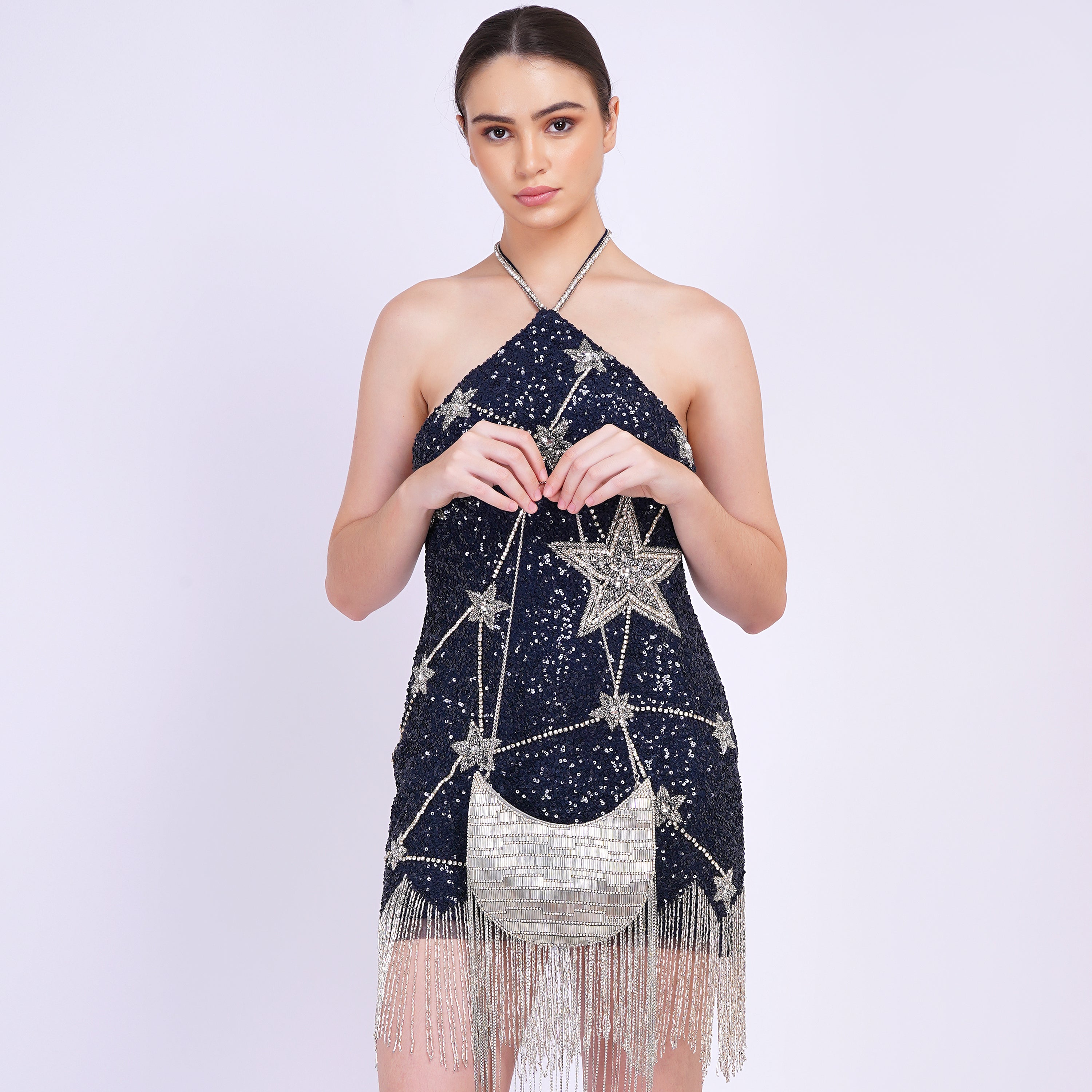 Twirl & Tassel Clutch Bag