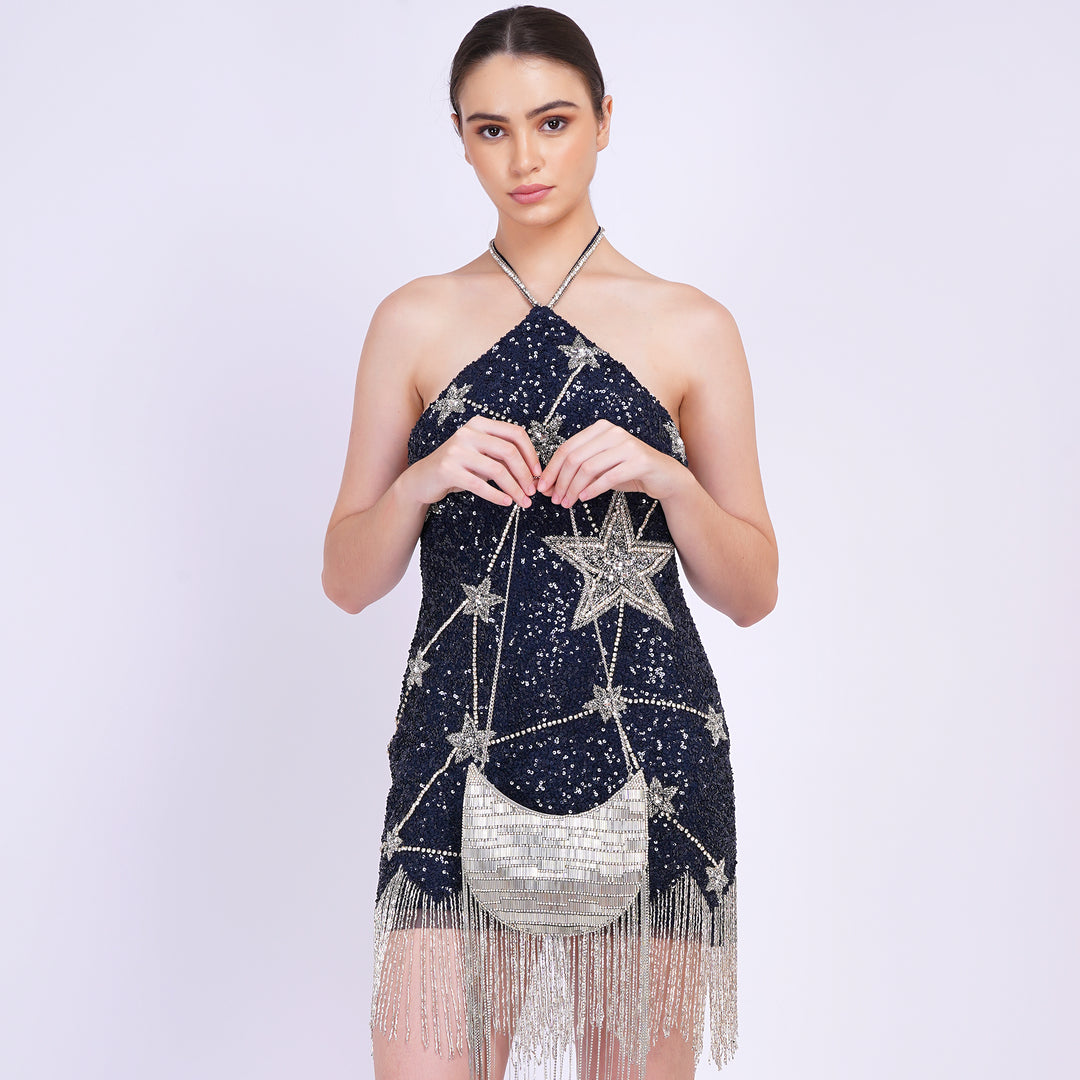 Twirl & Tassel Clutch Bag